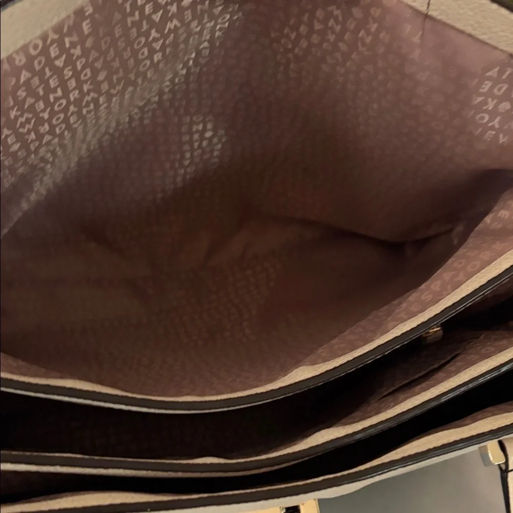 Kate Spade New York leather women’s Natacha Lovett street ivory satchel.